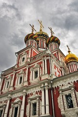 Fototapeta na wymiar Architecture of Nizhny Novgorod, Russia. Nativity (Stroganoff's) Church, also known as the Cathedral of the Blessed Virgin Mary. Popular touristic city situated on the Volga river.