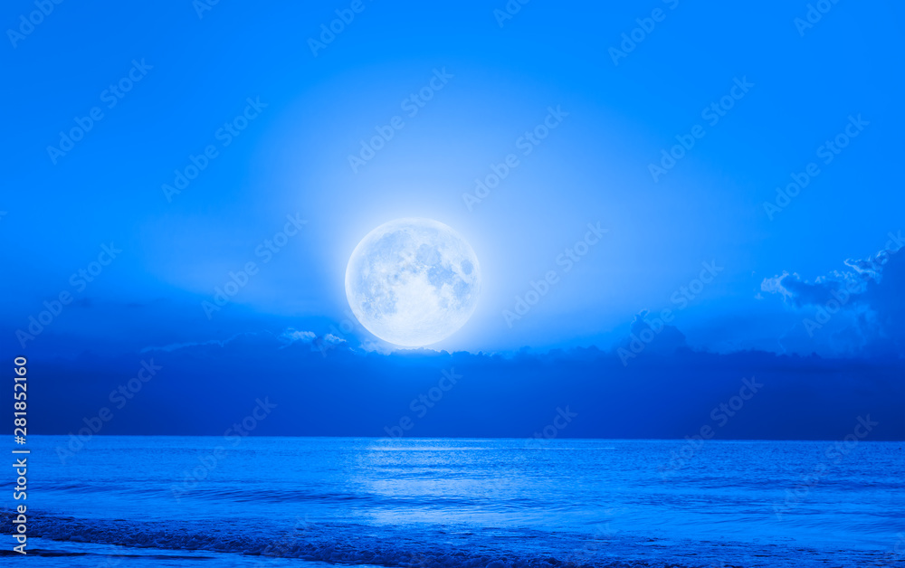 Wall mural Moon over the sea with lot of stars and nebula at night 