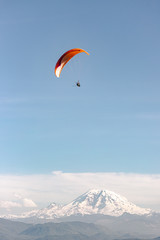 Fototapeta na wymiar paraglider near mountain 1