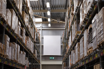 Metal shelving in a supermarket with goods