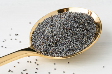 Poppy Seeds on a Gold Spoon