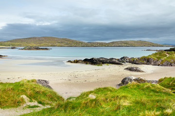 Obraz premium Abbey Island, the patch of land in Derrynane Historic Park, famous for ruins of Derrynane Abbey and cementery, located in County Kerry, Ireland