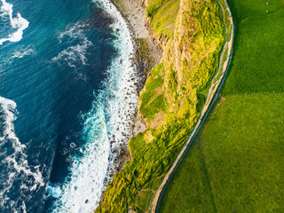World famous Cliffs of Moher, one of the most popular tourist destinations in Ireland. Aerial view of known tourist attraction on Wild Atlantic Way in County Clare.