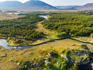 Beautiful sunset view of Connemara region in Ireland. Scenic Irish countryside landscape with...