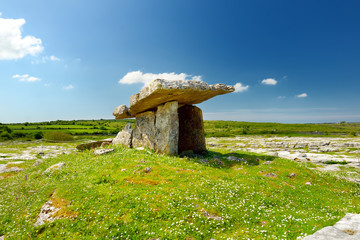 Poulnabrone dolmen, a neolithic portal tomb, tourist attraction located in the Burren, County Clare, Ireland - obrazy, fototapety, plakaty