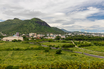 Fototapeta na wymiar View on Port Louis, the capital city of Mauritius island and mountains in the background