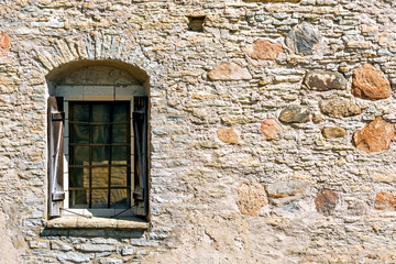 Fototapeta na wymiar Window on the fortress wall.