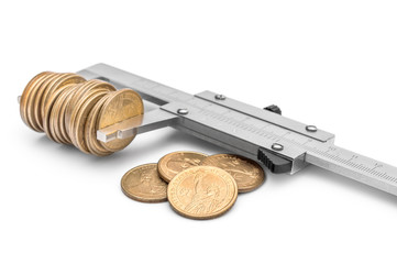 Vernier caliper with coins on white background. Business concept.