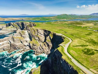 Crédence de cuisine en verre imprimé Atlantic Ocean Road Amazing wave lashed Kerry Cliffs, the most spectacular cliffs in County Kerry, Ireland. Tourist attractions on famous Ring of Kerry route.