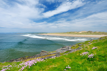 Spectacular Tullan Strand, one of Donegal's renowned surf beaches, framed by a scenic back drop provided by the Sligo-Leitrim Mountains.