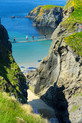 Carrick-a-Rede Rope Bridge, famous rope bridge near Ballintoy in County Antrim, linking the...