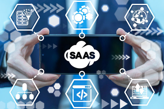 SAAS Software As A Service Cloud Data Transformation Mobile Technology. Man hold smartphone with saas cloud icon on screen.