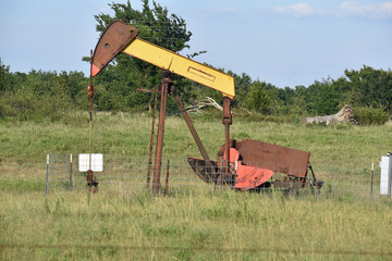 Oil Derrick in Field