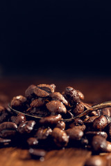 Coffee seeds close up covered with drops of water.