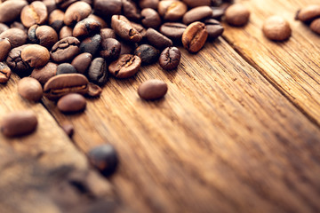 Morning with delicious coffee. Coffee seeds from above as a background.