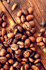 Morning with delicious coffee. Coffee seeds from above as a background.