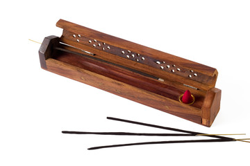 incense sticks with a wooden box isolated on white background