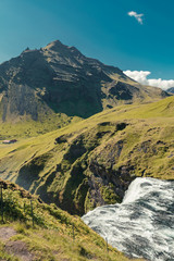 waterfall from above in green iceland