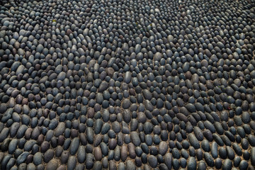 polished stone gray pebble stone pavement