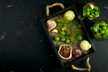 Fototapeta na wymiar TEXTURE OF VEGETABLES IN A BOX ON A DARK BACKGROUND. CONCEPT OF PREPARING VEGETABLES FOR WINTER.