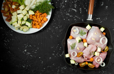 Fresh green zucchini on a dark table. The view from the top. Copy space.