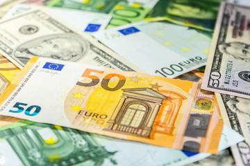 Close up on various Euro USD Dollars and CHF banknotes on the table business and finance money wealth savings credit finance
