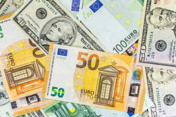 Close up on various Euro USD Dollars banknotes on the table business and finance money wealth savings credit finance