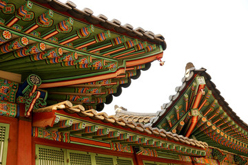 Fototapeta na wymiar Part of the roof of an ancient Korean palace building. Deoksugung Palace, Seoul.