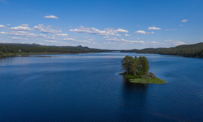 Obraz premium Aerial(drone) panoramic view on lake Storån-Österdalälven. Idre, Sweden, July 2019