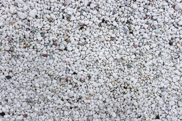Pattern surface covered with small white gravel pebble stone.