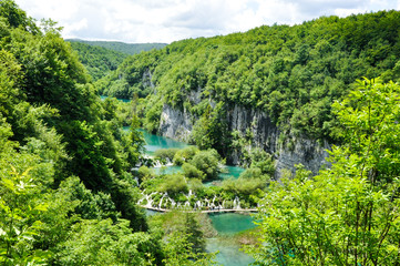 Fototapeta na wymiar Beautiful Plitvice Lakes National Park in Croatia during the summer. Waterfalls and lakes complete this lush wonderland.