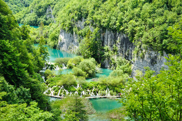 Beautiful Plitvice Lakes National Park in Croatia during the summer. Waterfalls and lakes complete this lush wonderland.