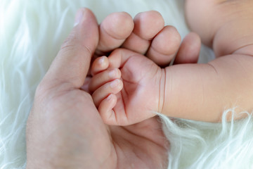 mother hand and newborn hand