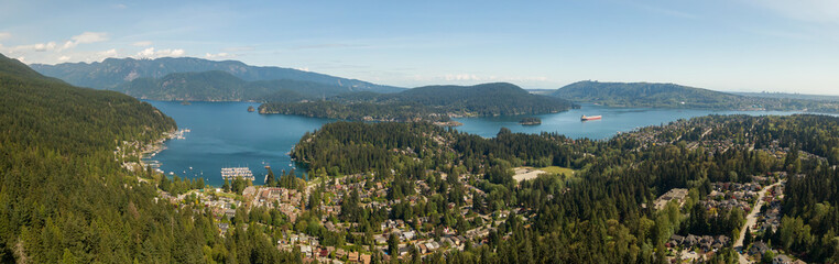 Fototapeta na wymiar Aerial panoramic view of residential neighborhood in Deep Cove during a sunny day. Located in North Vancouver, British Columbia, Canada.