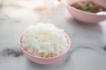 Steamed rice in a cup Asian Culture  on the table