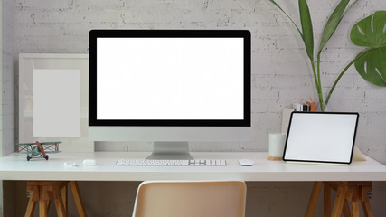 Minimal comfortable workplace with blank screen desktop computer