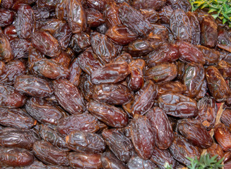 Persimmon fruit close-up. With dark brown color