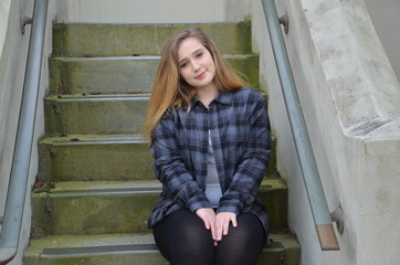 Plaid girl on stairs