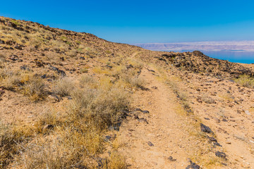 View from the Zara trail, near the Panorama Dead Sea Complex in Jordan. Zara Cliff Walk offers stunning views of the Dead Sea coast.