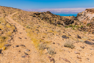View from the Zara trail, near the Panorama Dead Sea Complex in Jordan. Zara Cliff Walk offers stunning views of the Dead Sea coast.