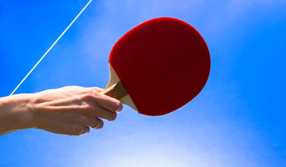 Blue table tennis or ping pong. Playing ping pong. Close up ping pong net and line. Table tennis or...