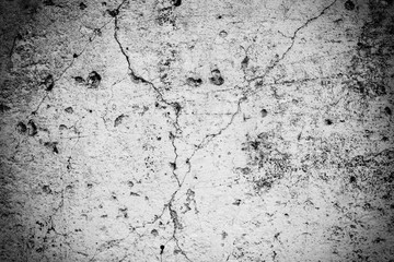 Obraz premium Texture of a concrete wall with cracks and scratches which can be used as a background