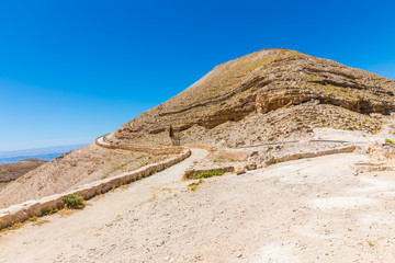 View of the Machaerus Mountain near the Dead Sea in Jordan. It is the location of the imprisonment and execution of John the Baptist. 