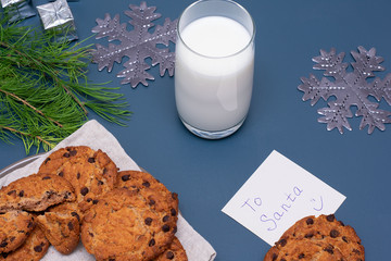 Note the position of Santa Claus on a plain background. Holiday concept, New Year and Christmas.