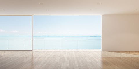 Perspective of empty modern living room on sea view background,The sun light cast shadow on the timber floor. - 3D rendering.