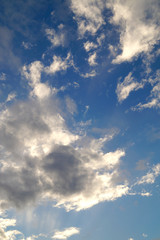 Obraz premium Large white cumulus clouds on a blue sky for background or ecology or nature.