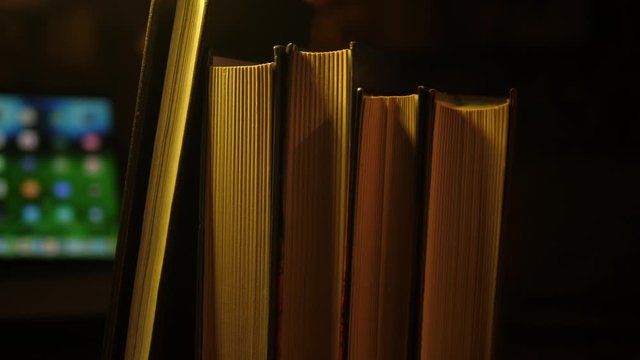 Old Books and tablet Defocused in the Background