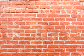 Fototapeta premium A rustic red brick background