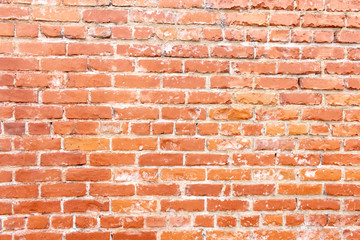 A rustic red brick background
