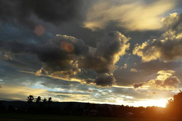 Golden sky in the evening time.